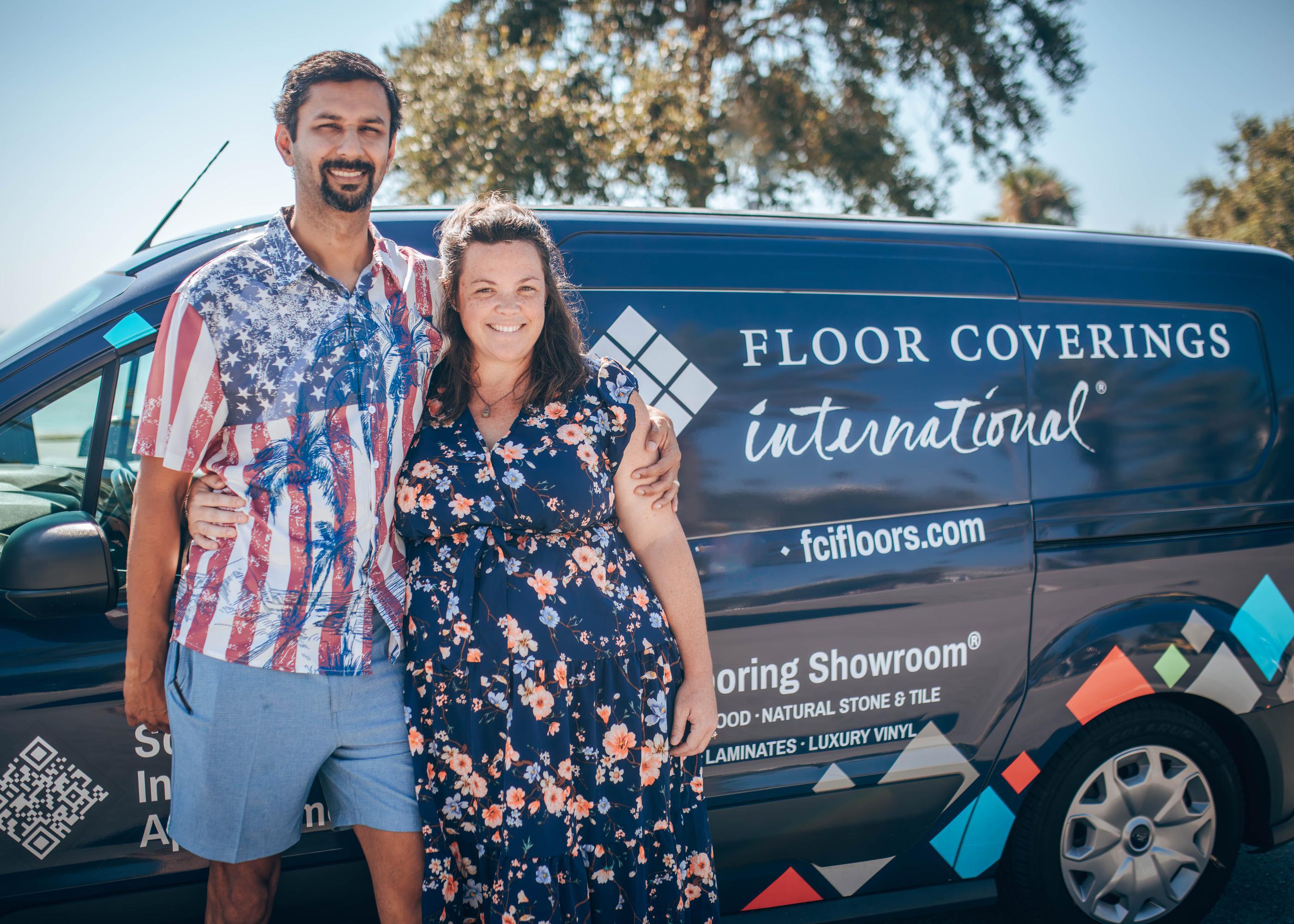 Charlotte Gillett and husband in front of FCI mobile showroom