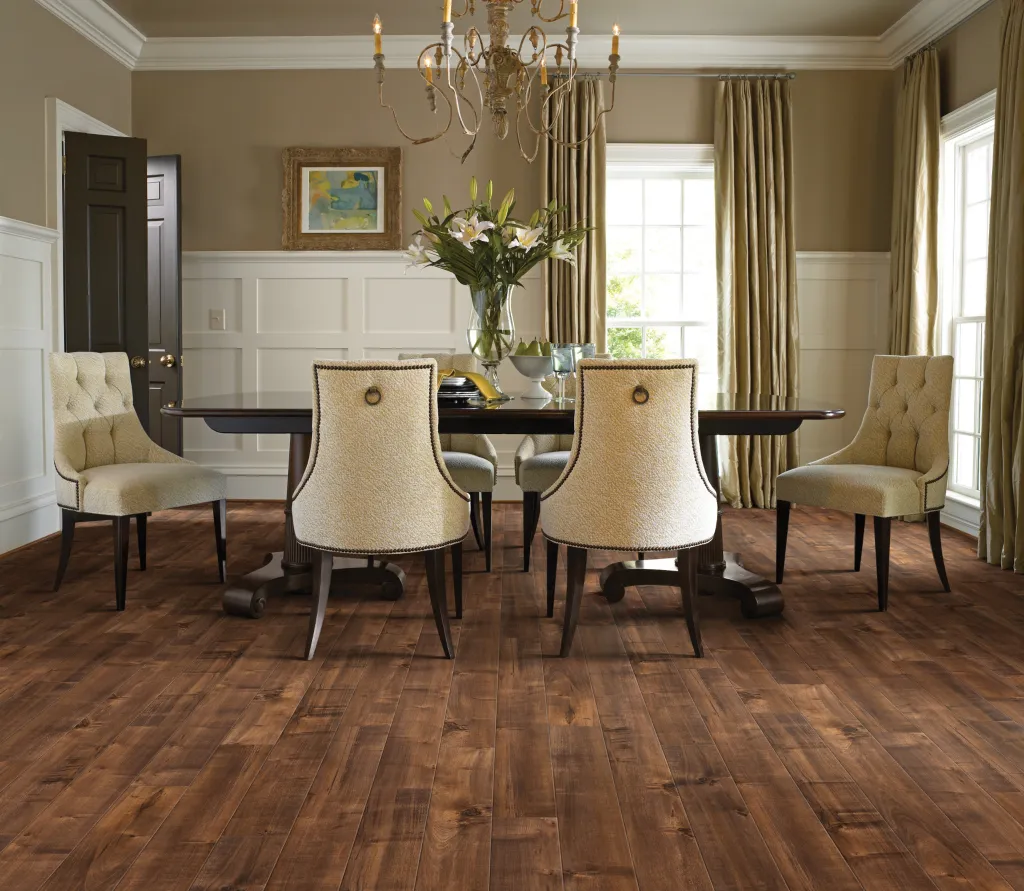 Dining room with brown laminate flooring