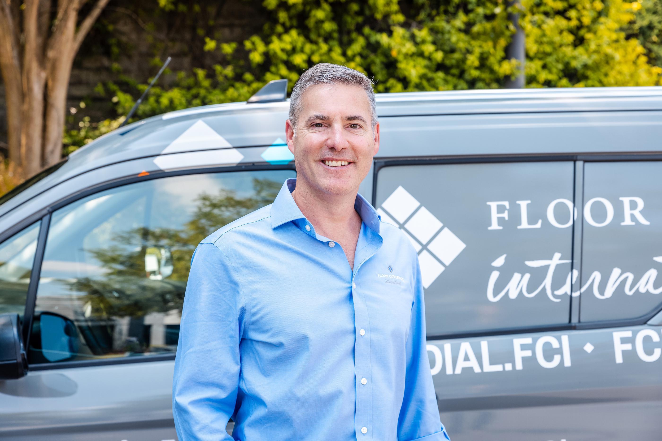 Headshot of Blake Latta in front of FCI mobile showroom