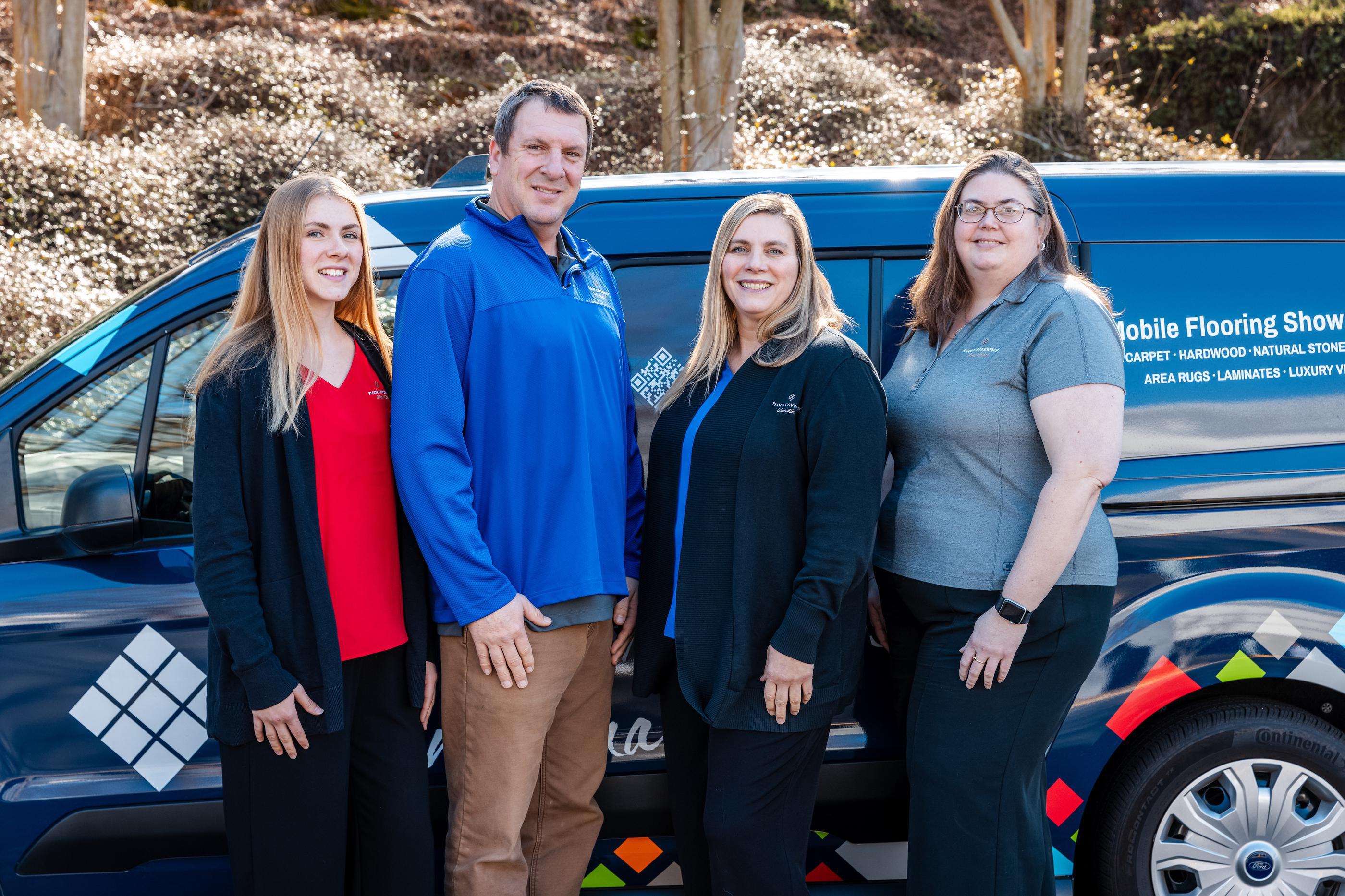 FCI employees in front of FCI mobile showroom