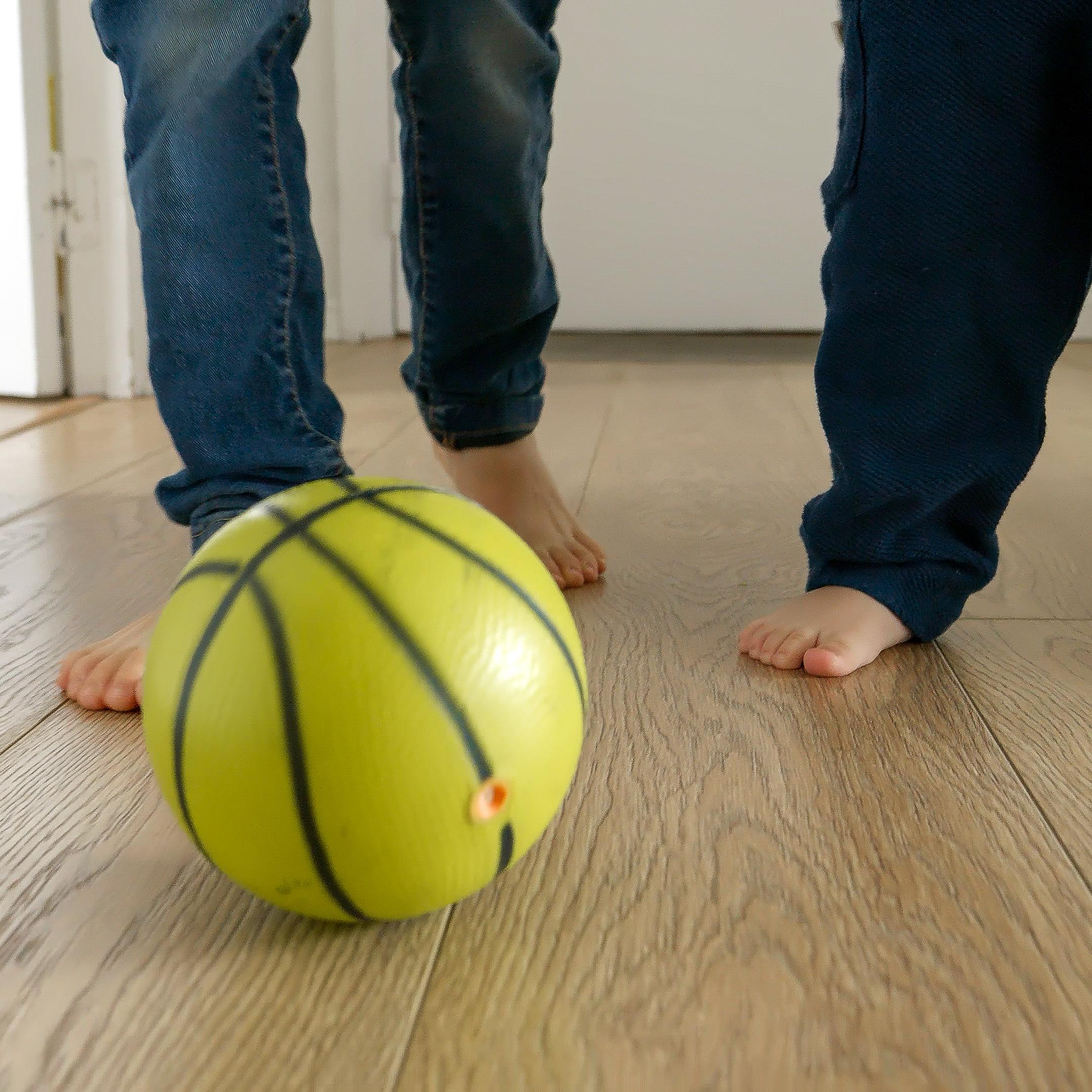 Laminate flooring in a home with children and pets, showing scratch resistance.
